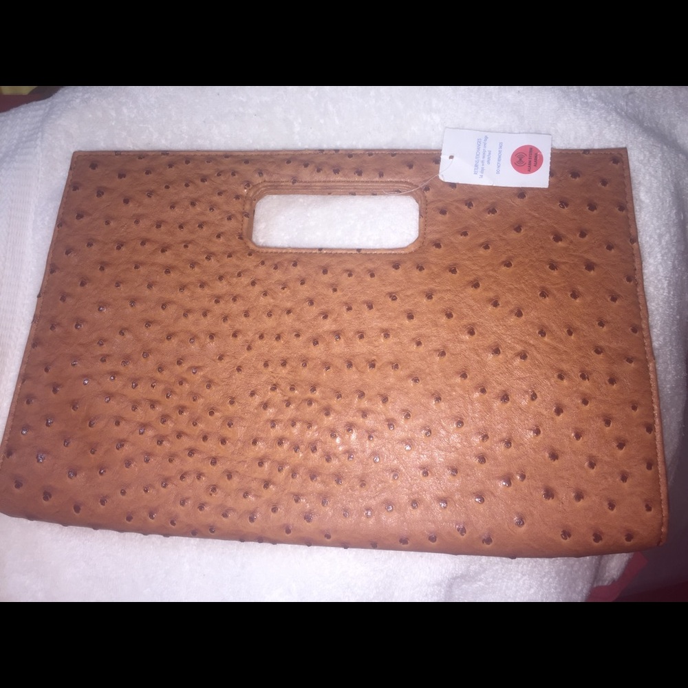 A very nice hand bag!! Brand new